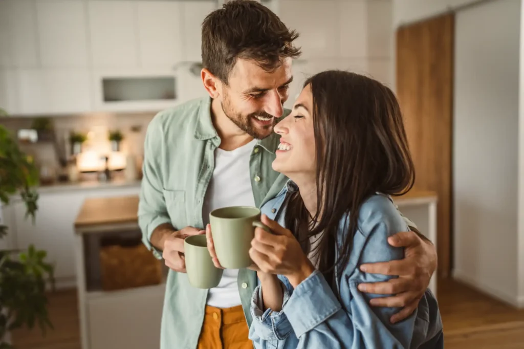 Husband and wife drinking coffee together in the morning